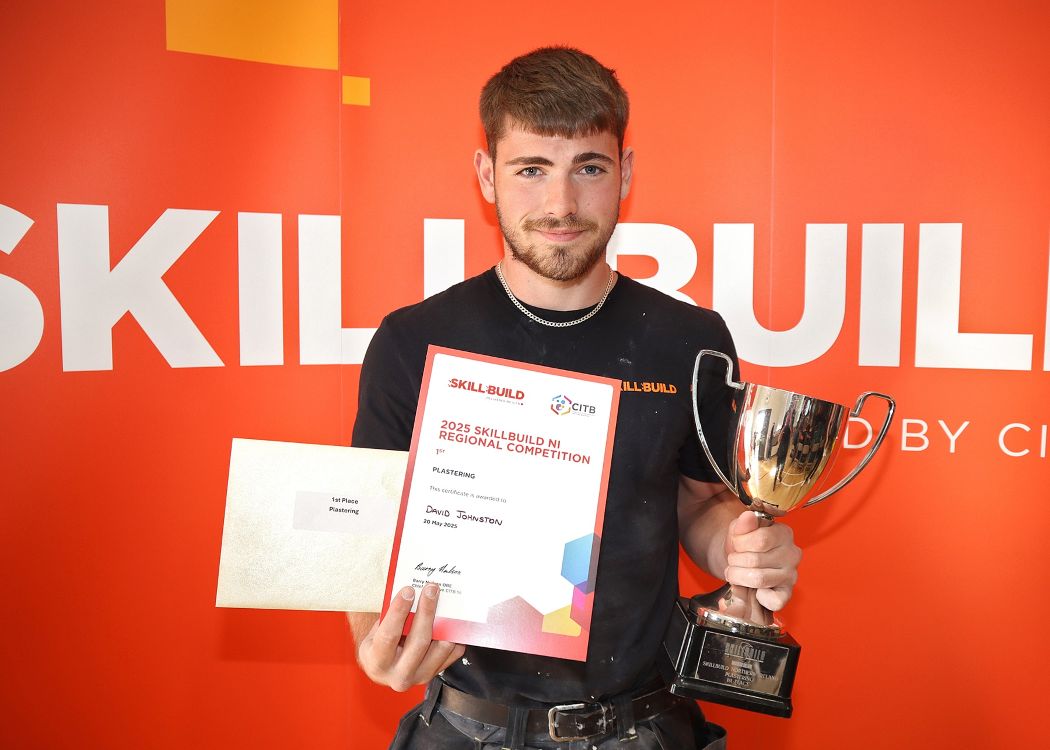 SERC Apprentice David Johnston with his trophy and certificate from the NI SkillBuild regional final
